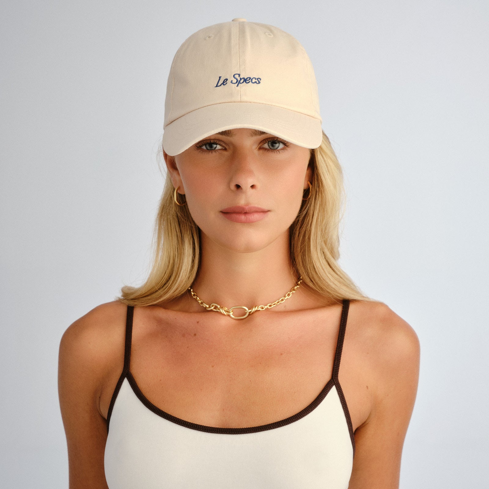 Less26mar2 Cream Uni-Sex Accessories Marketing | Le Specs