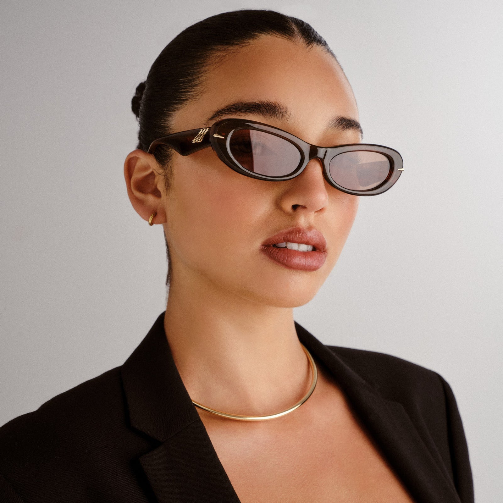 Numero Uno Teak Female Oval Sunglasses | Le Specs