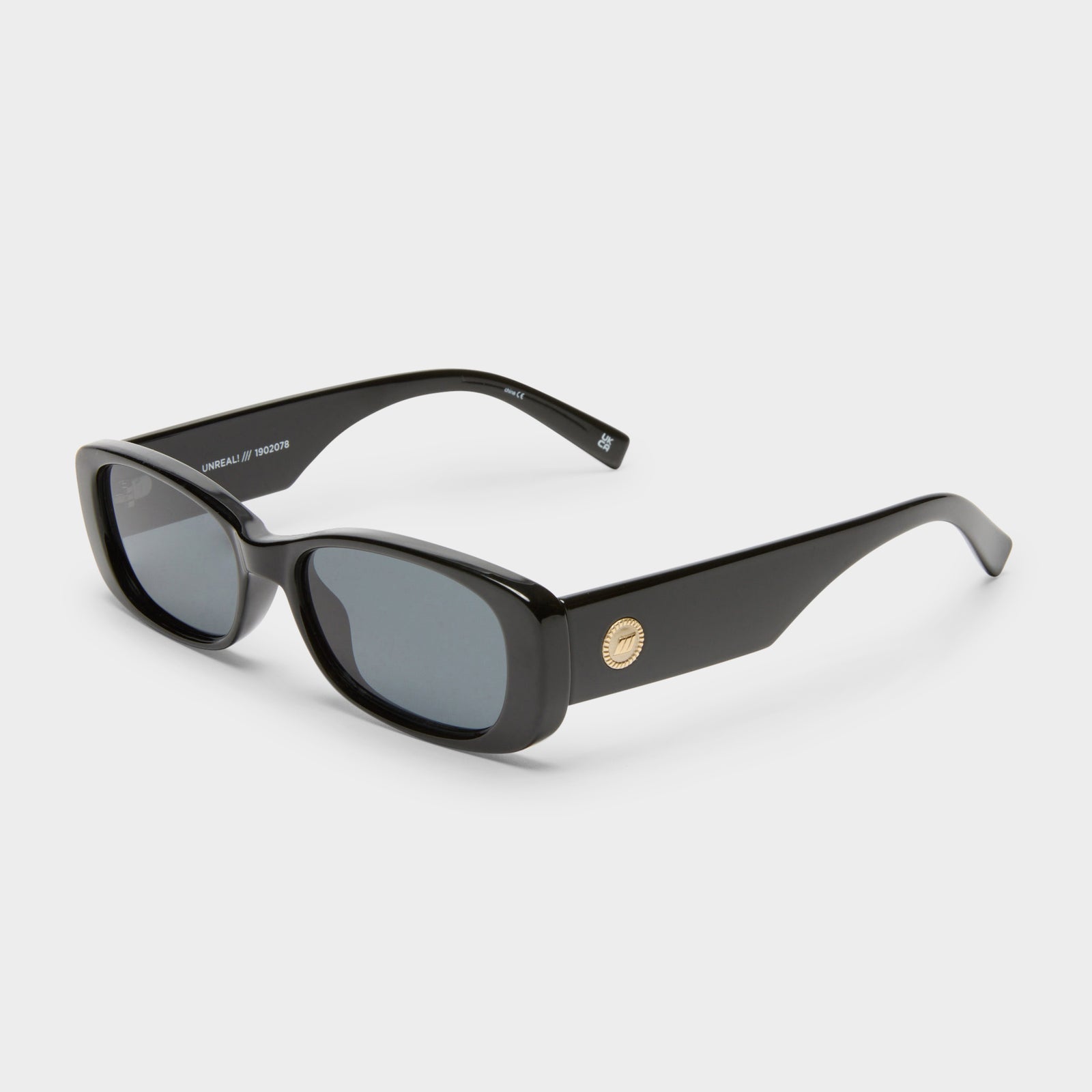 Unreal Shiny Black Uni-Sex Rectangle Sunglasses | Le Specs