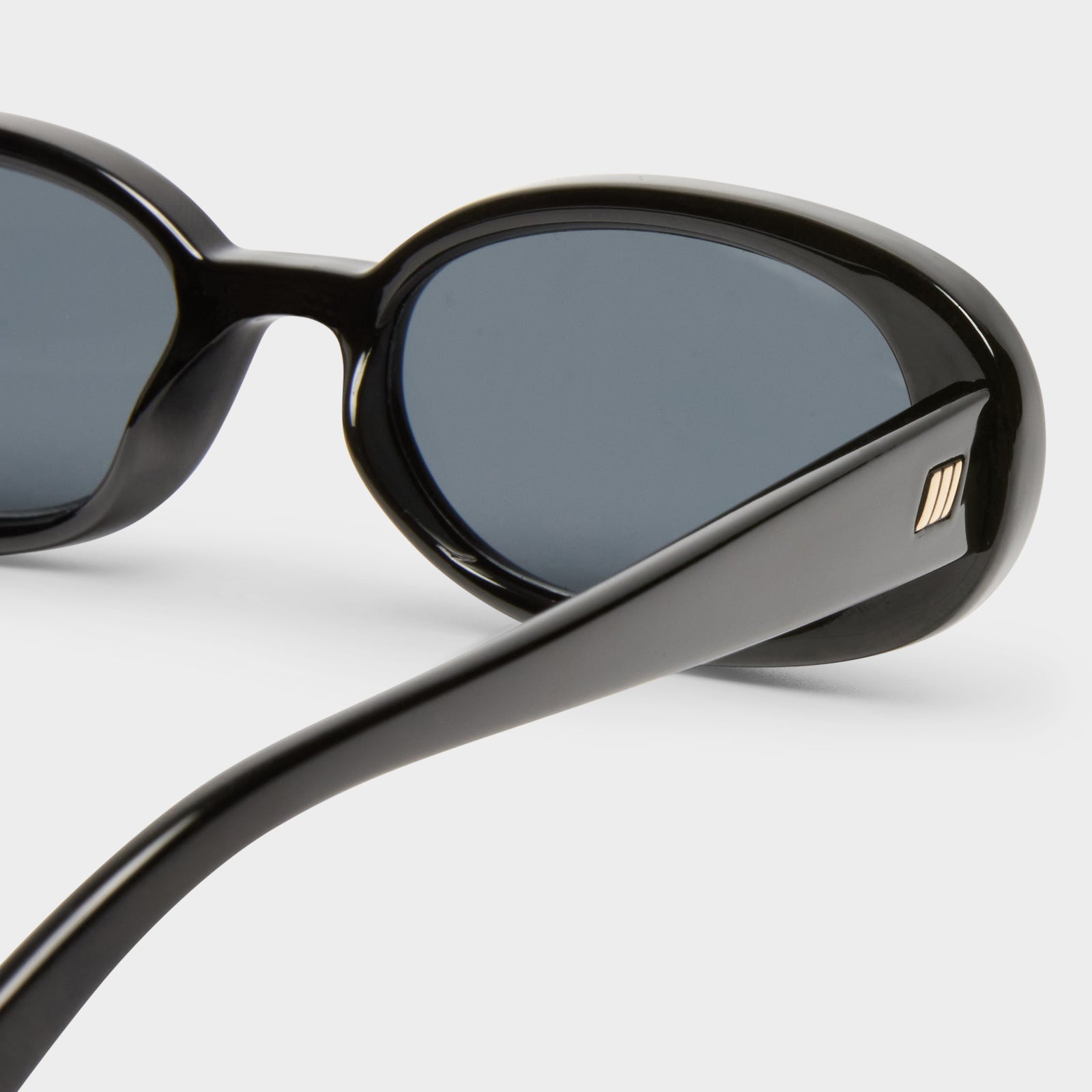 Outta Love Black Uni-Sex Oval Sunglasses | Le Specs