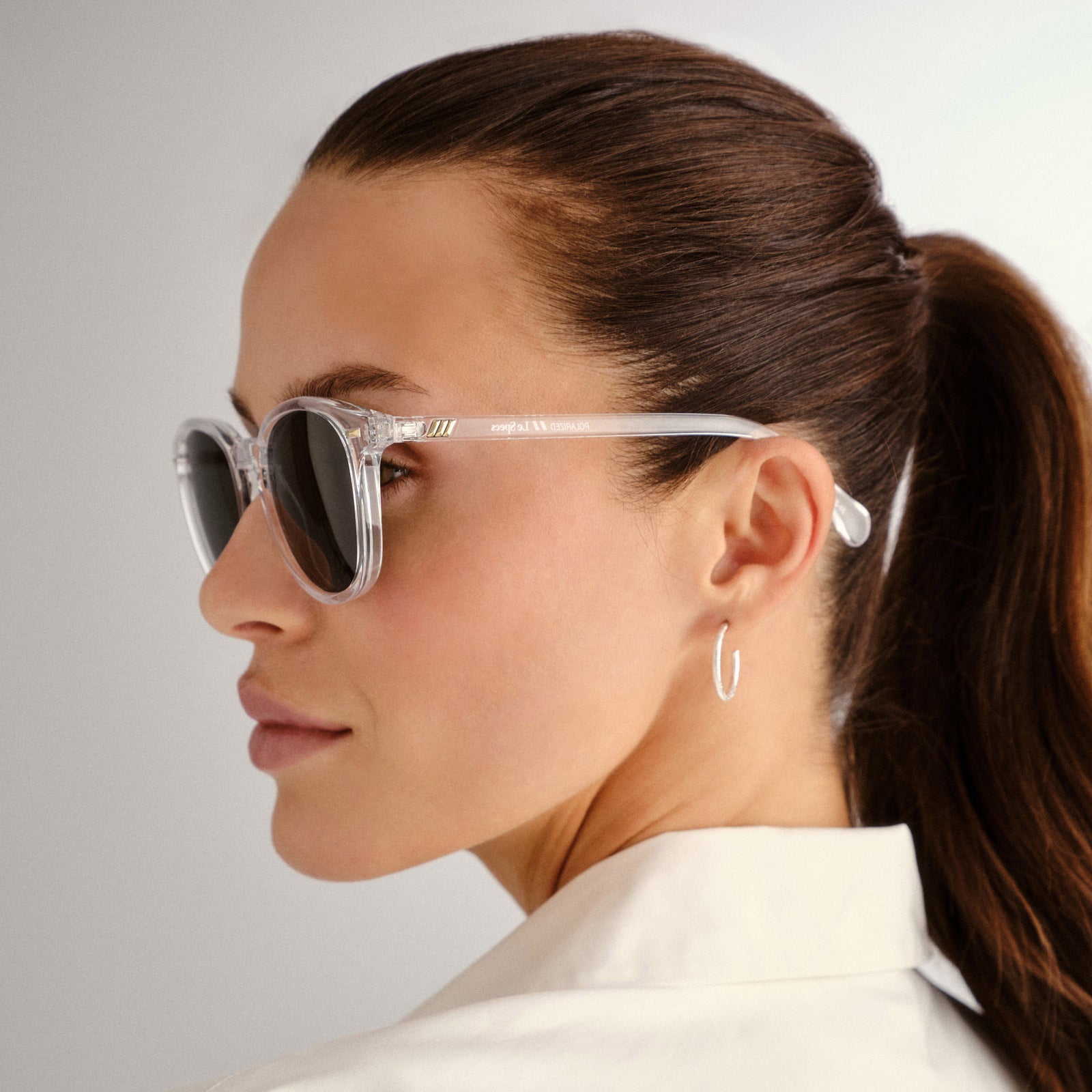 Bandwagon Crystal Clear Uni-Sex Round Sunglasses | Le Specs