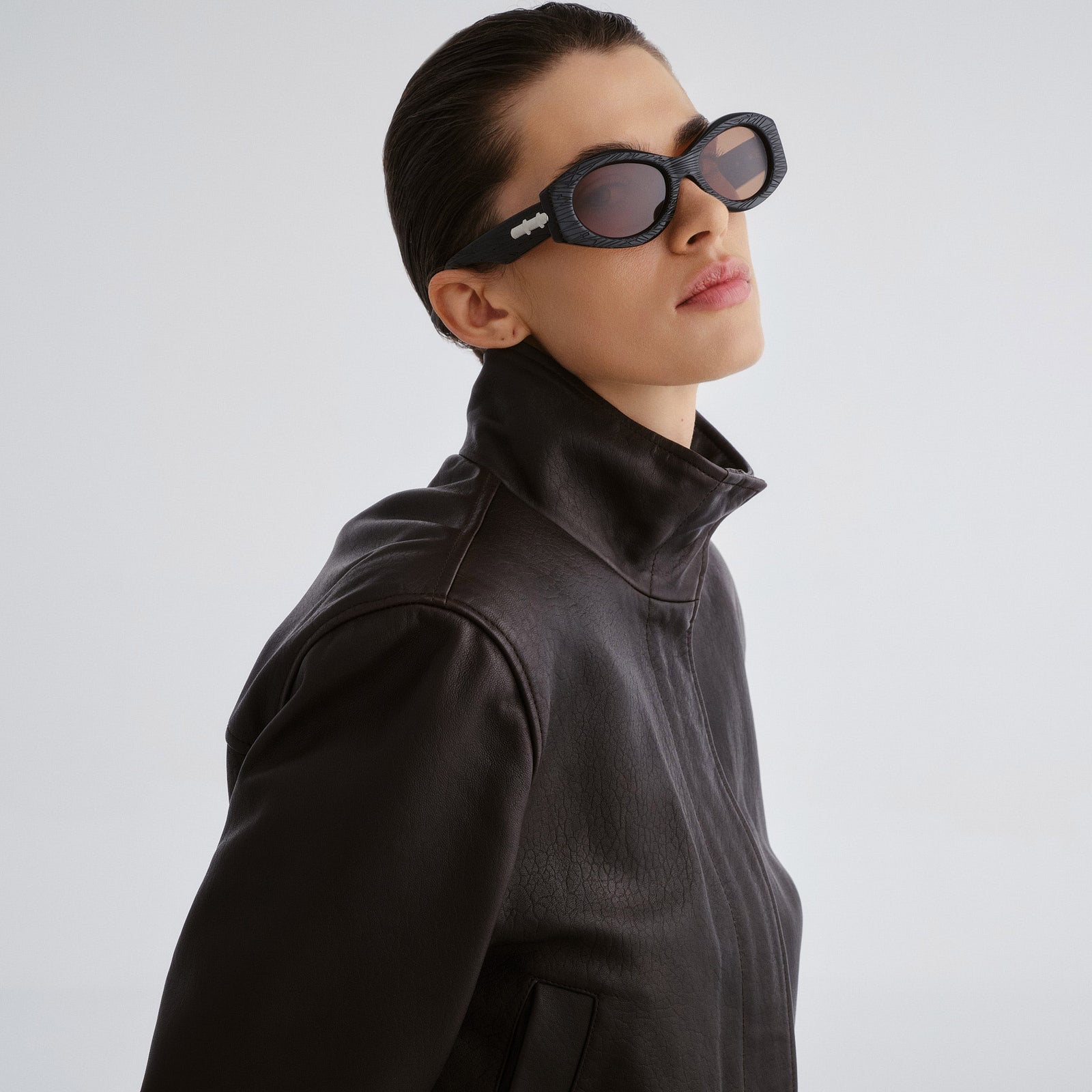 Wanderlust Scratched Black Uni-Sex Oval Sunglasses | Le Specs