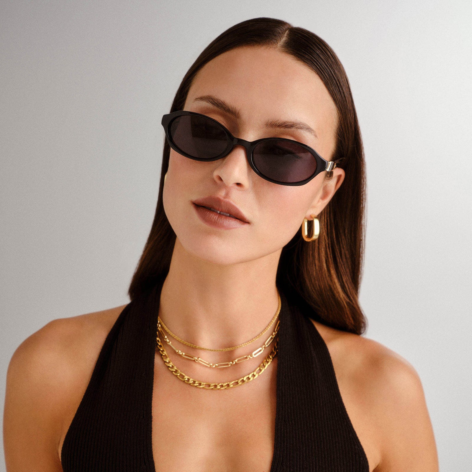 Lunita Black Female Oval Sunglasses | Le Specs