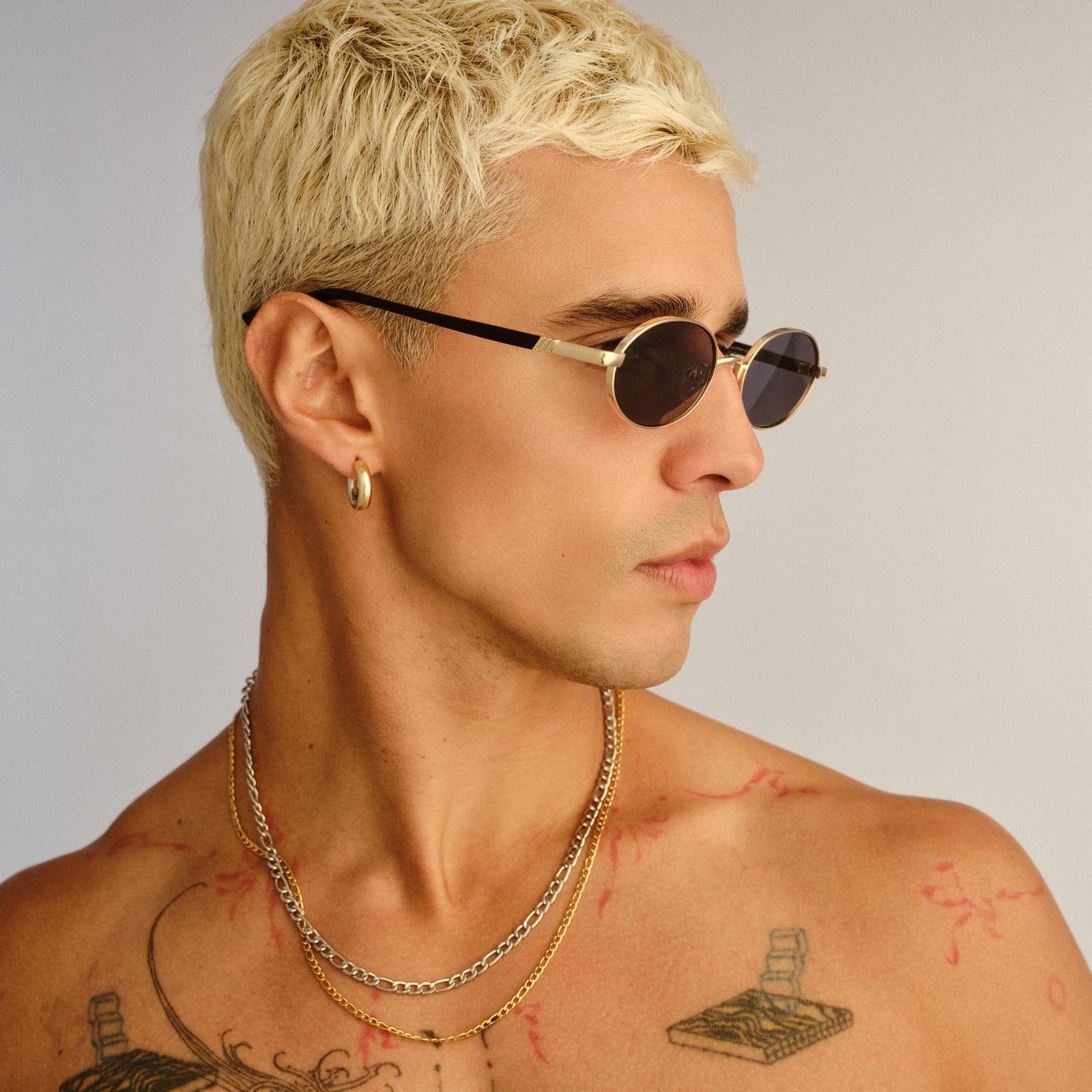 Icicle Bright Gold Uni-Sex Oval Sunglasses | Le Specs