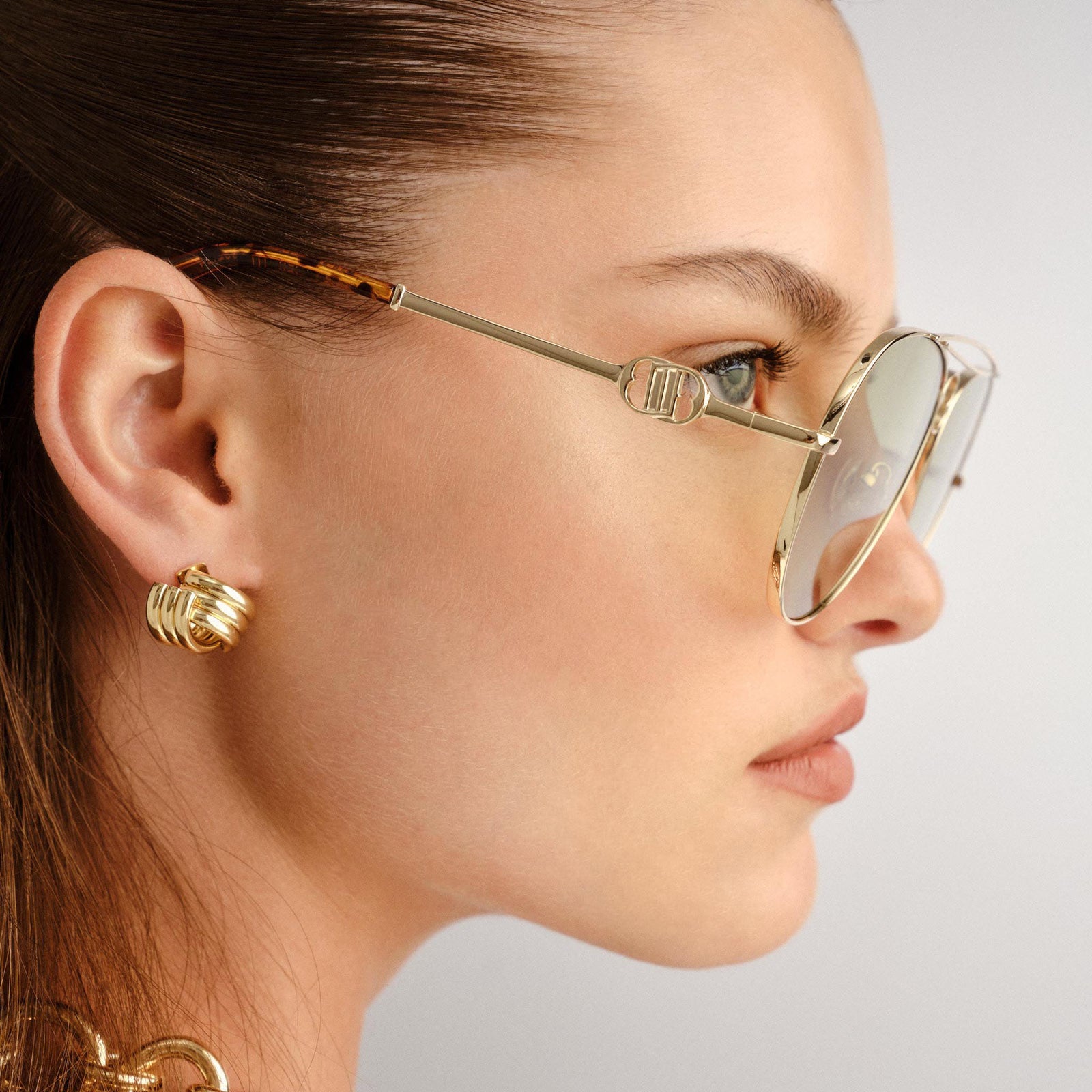 Abracadabra Bright Gold Female Aviator Sunglasses | Le Specs